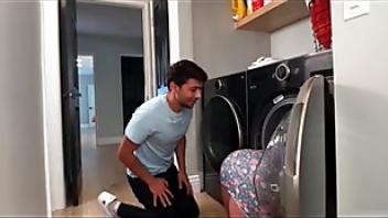Milf loading the washing machine but got stuck and her stepson took advantage of it fucking machine