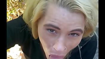Blonde streetwalker takes a huge facial out in public during the day after a long blowjob in the back seat of a car skank facial